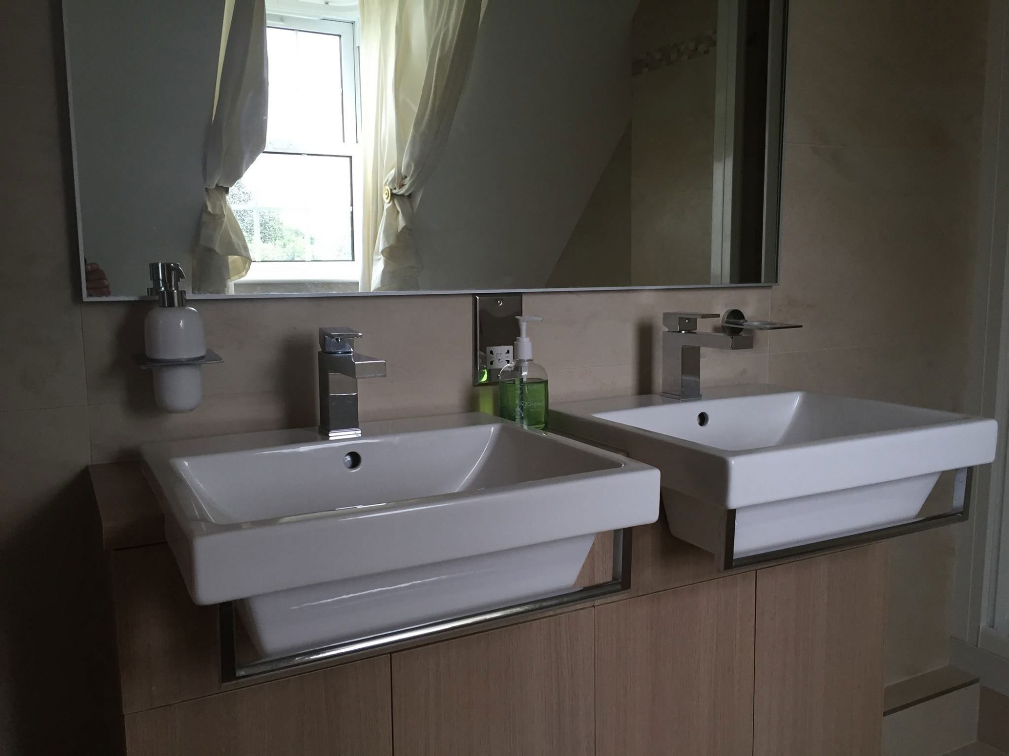 Style Plumbing & Heating double sink in bathroom